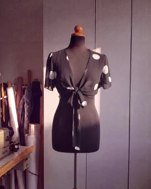 Tie‑Front Polka Dot Mousseline Blouse with Volant Sleeves